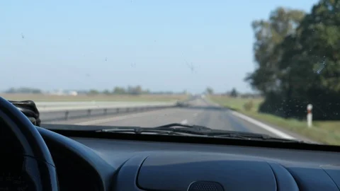 Blurred highway view from inside of moving car 動画素材 100975050