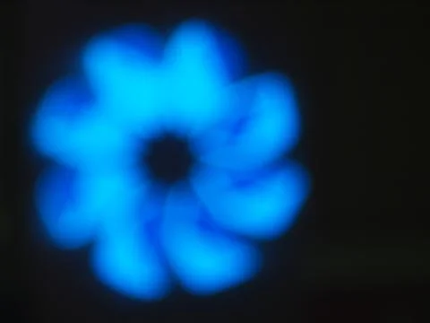 Blurred image of an abstract blue shapes closeup Stock Photos