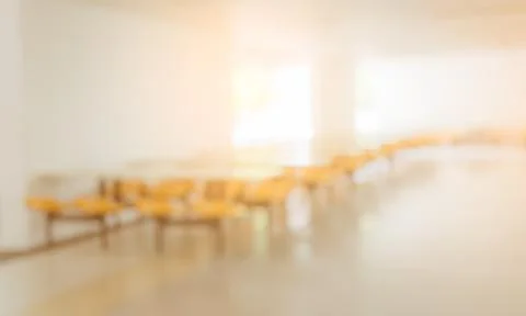 Blurred image background of empty seats and tables in the clean cafeteria or Stock Photos
