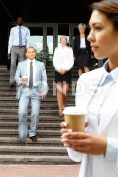 Blurred image of business people coming downstairs Stock Photos