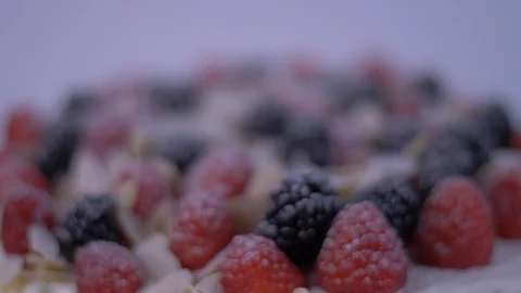Blurred image of Cake Rotating, Cake, Berries Stock-Footage 128078176