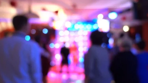 Blurred image of the dance floor in a restaurant or nightclub. Out of focus,  Video stock 80938784