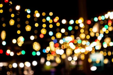 Blurred image Decorative outdoor string lights hanging in the garden at night 스톡 사진