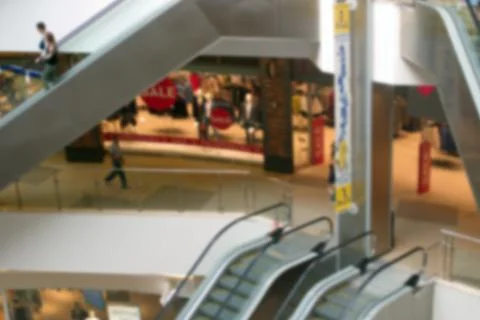 Blurred image of escalators in the Mall. Stock Photos