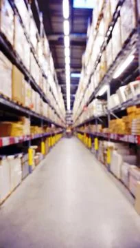 Blurred Image Inside A Modern Warehouse. Stock Photos