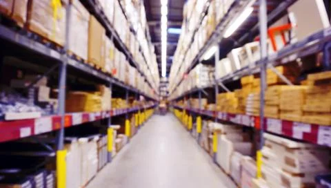 Blurred Image Inside A Modern Warehouse. Stock Photos