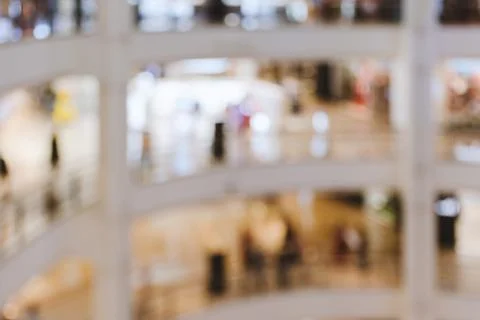 Blurred image - interior of large multi-story shopping mall Stock Photos