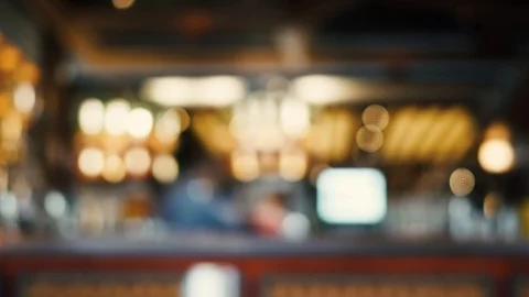 Blurred image of the interior of a large restaurant with bright lighting Stock Footage 100611903