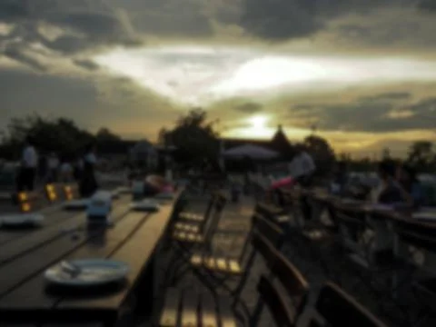 Blurred image of Outside restaurant At sunset Foto stock