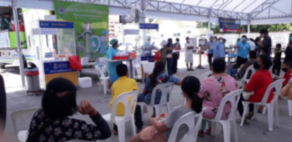 Blurred image. People waiting in queue for covid test 19. Fotos de archivo