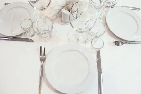 Blurred image serving restaurant table before the event. Toned image. Stock Photos