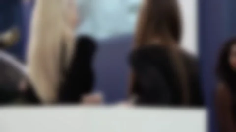 Blurred image of silhouettes of young and beautiful girls. Stock Footage 153317487