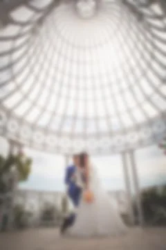 Blurred image of a wedding theme on the beach of the embankment of a young co 스톡 사진