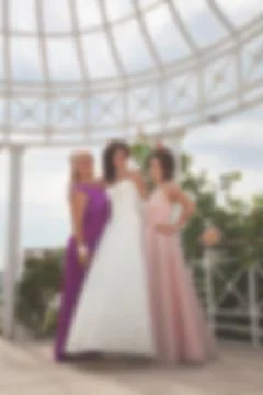 Blurred image of a wedding theme on the beach of the embankment of a young co Stock Photos