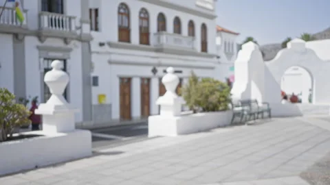 Blurred image of a white building with balconies and arches in lanzarote in.. Vídeos de archivo 294671871