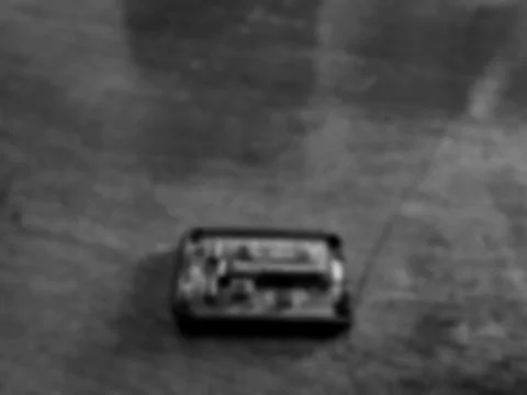 Blurred Inside View of Car Remote Control Circuit Board and Battery Stock Photos