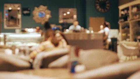 Blurred of the interior restaurant with lighting. Defocused restaurant visitors Stock Footage 96389469