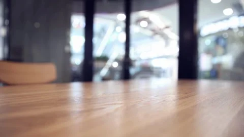 Blurred Interior View of Modern Office Space with Wooden Table Stock Footage 309546237
