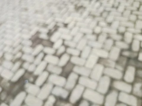 Blurred Interlocking Brick Pavement Texture Background Stock Photos