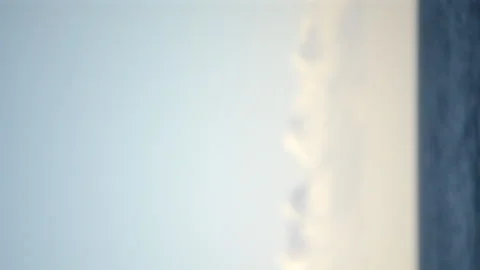 Blurred landscape background. Blue sky, white clouds, blue sky. Seascape. Stock Footage 219576771