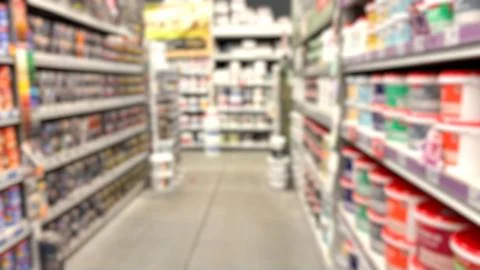 Blurred large hardware store. Defocused home improvement store Stock Photos
