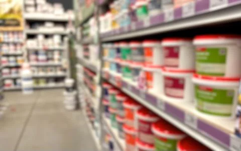 Blurred large hardware store. Defocused home improvement store Stock Photos