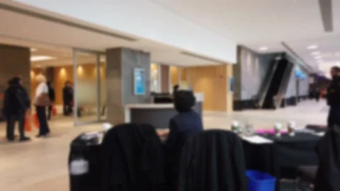 Blurred Left To Right Panorama Of Real Estate Convention In Hotel With Peopl Stockbeeldmateriaal 154774536