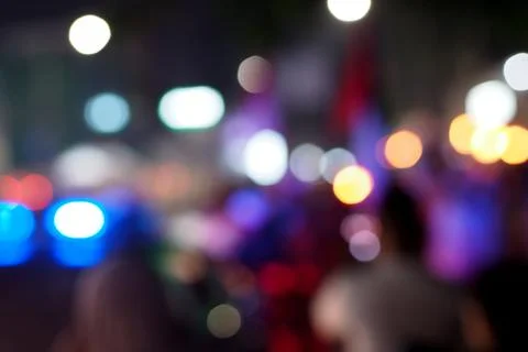 Blurred light in the crowd at night Stock Photos