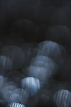 Blurred light on dark background overlay Stock Photos
