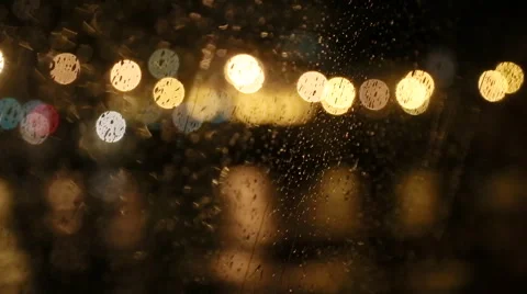 Blurred light at night while it's raining at night. The Seine, Paris. Stock-Footage 56529342