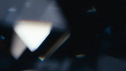 Blurred light reflections leaks spinning on a black background Stock Footage 180149886
