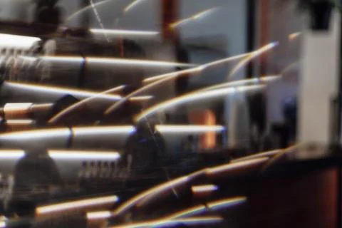 Blurred lights create dynamic scene of trails, reflections, blending colors i Stock Photos