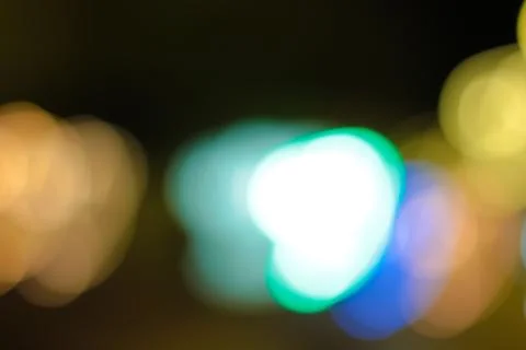 Blurred Lights in Motion with Bokeh Effect, Slow Shutter Speed Creating Abstr Stock Photos