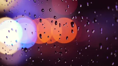 Blurred lights in a rainy day Stock Footage 178935364