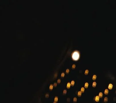 Blurred Lights on String Abstract Night Golden Bokeh Warm Night Illumination Stock Photos