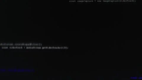 Blurred lines of abstract software code moving top to bottom on a black monitor  Stock Footage 317672926