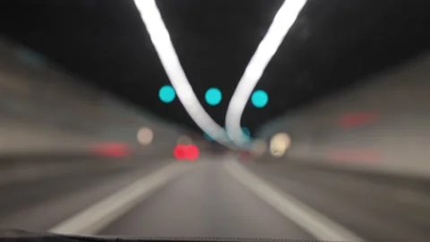 Blurred lines of ceiling and traffic nights in tunnel as seen from Car Stock Footage 158098269