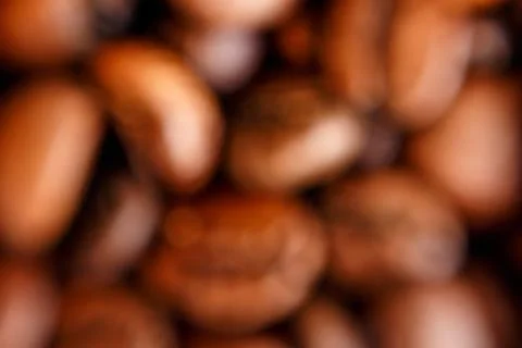 Blurred loose large coffee beans Stock Photos