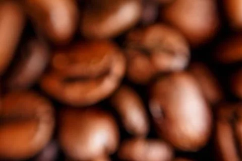 Blurred loose large coffee beans Stock Photos
