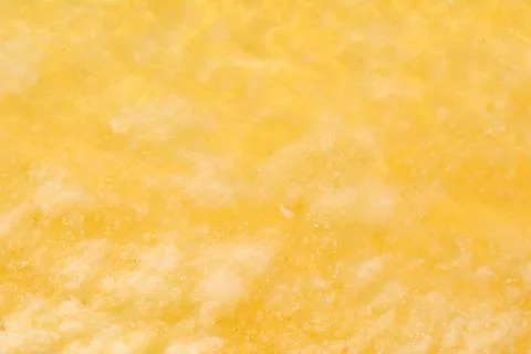 Blurred macro chips with salt background. Defocused Potato snack texture. Sel Foto stock
