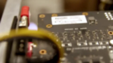 Blurred macro details of a custom cryptocurrency mining rig with electronic.. Stock Footage 342036016