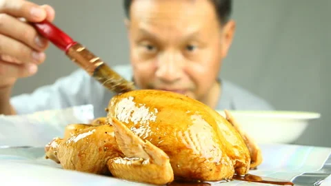 Blurred man applying sauce on Raw chicken  , in studio Chiangmai Thailand Stock-Footage 145125669