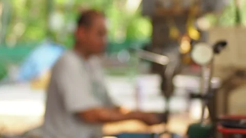 Blurred of man installation drilling machine in the workshop Stock Footage 136867888