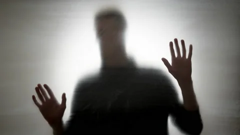 Blurred man looking for a way out. The concept of loneliness, mental healt 스톡 동영상 204100230