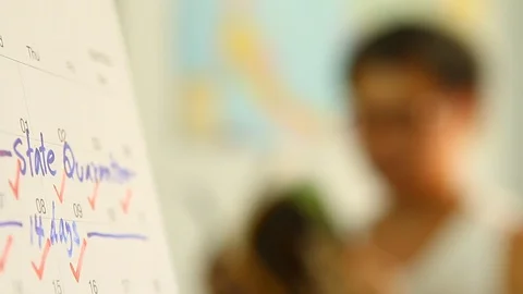 Blurred man reading book  in room while guarantine  himself  , in  door  Chiangm Stock Footage 128727780