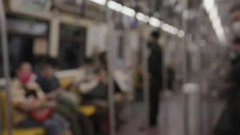 Blurred Many people are using train travel, mass transit. By wearing a face mask Stock Footage 144116484