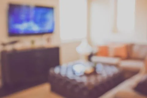 Blurred Modern Living Room with Television applying Retro Instagram Style Fil Stock Photos