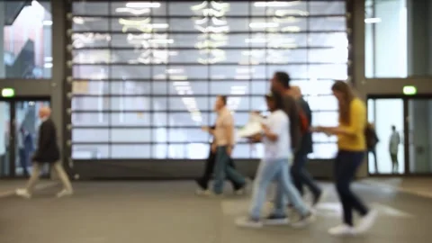 Blurred motion of a lot of people walking through shot at a trade fair, sho.. Stock-Footage 337463778