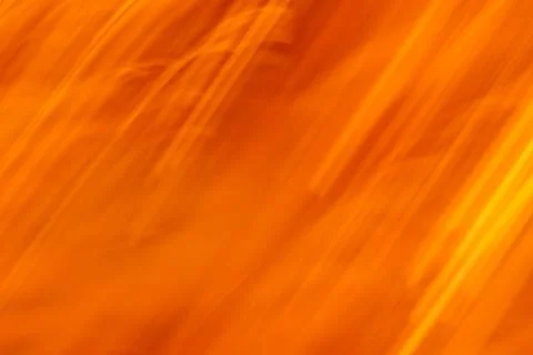 Blurred motion minimalistic background of Mars. Red desert surface blur abstr Stock Photos