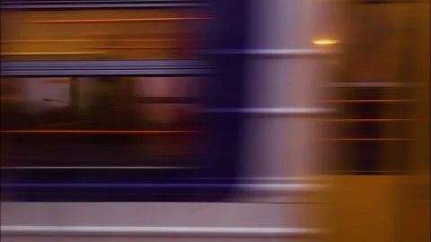 Blurred in motion passenger train moves at high speed. Visual effect. Stock-Footage 283896660
